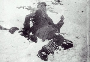 Big Foot, chief of the Lakota Sioux who, defying the U.S., tried to escape their reservation confinement, lies dead in the snow at Wounded Knee, 1890. 